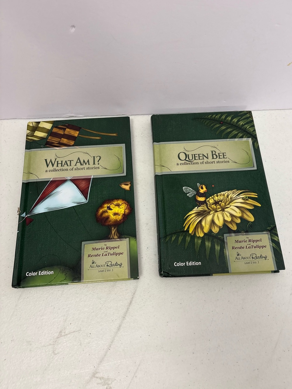 All About Reading Level 2 Readers, Vol. 1 & 2, "What Am I?" & "Queen Bee"
